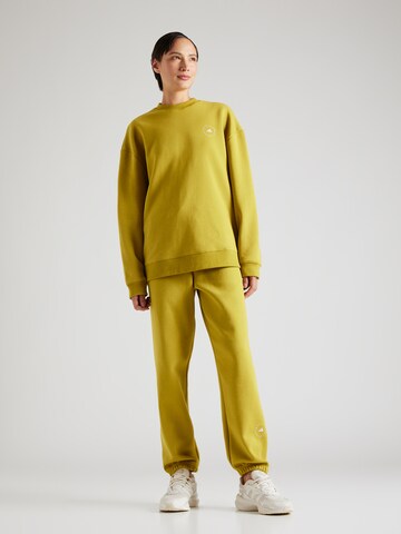 ADIDAS BY STELLA MCCARTNEY Zwężany krój Spodnie sportowe w kolorze żółty