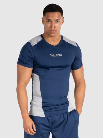 T-Shirt fonctionnel 'Maison' Smilodox en bleu : devant