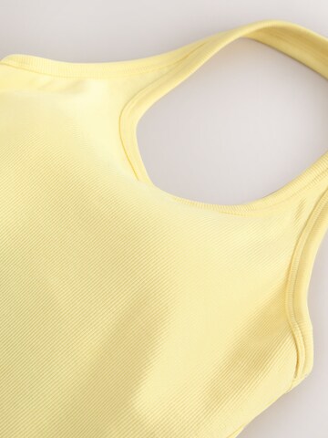 Next - Top en amarillo
