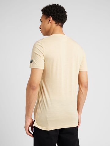 T-Shirt fonctionnel 'BETTER A FISH THAN ME' super.natural en beige