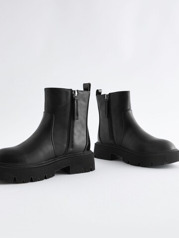 Bottes Next en noir