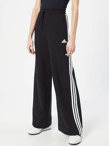 ADIDAS SPORTSWEAR - Pierna ancha Pantalón deportivo 'Essentials 3-Stripes French Terry Wide' en negro: frente