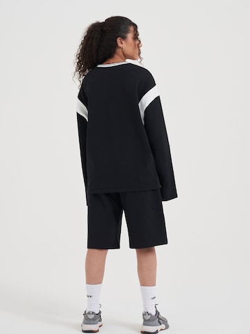 AND1 Sweatshirt 'Core 93' in Zwart