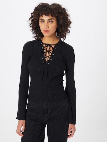 Warehouse - Jersey 'Eyelet' en negro: frente