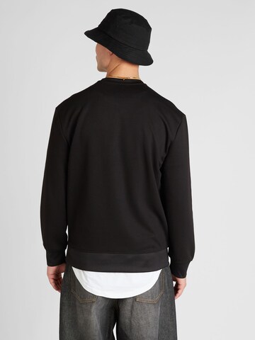 ARMANI EXCHANGE Sweatshirt i svart