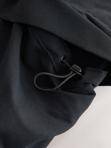 Next - Tapered Pantalón cargo en negro
