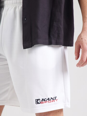 Karl Kani - Loosefit Pantalón en blanco