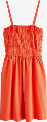 Rochie de la Next pe portocaliu: față