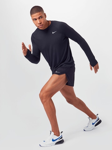 NIKE Regular Sportbroek 'FAST' in Zwart