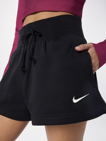 Nike Sportswear Loosefit Shorts 'Phoenix Fleece' in Schwarz