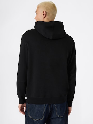 Felpa di Champion Authentic Athletic Apparel in nero