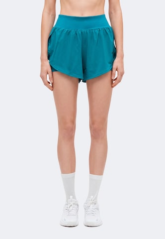 Regular Pantalon de sport NIKE en vert : devant