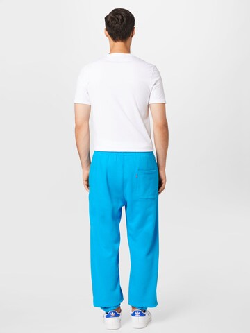 LEVI'S ® Tapered Byxa 'Levis Sweatpant' i blå