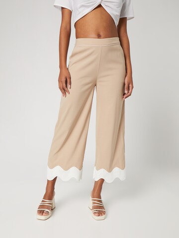 Katy Perry exclusive for ABOUT YOU Boot cut Trousers 'Nora' in Beige: front