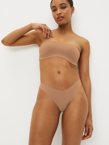 Next String i beige