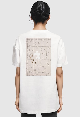Merchcode T-Shirt 'Missing Piece' in Weiß: predná strana