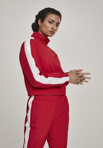 Veste mi-saison Urban Classics en rouge : devant