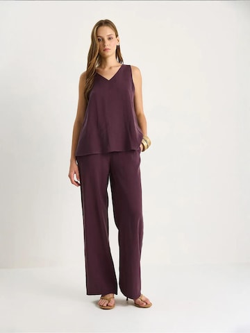 Pantalons de tailleur Bianco Lucci en violet : devant