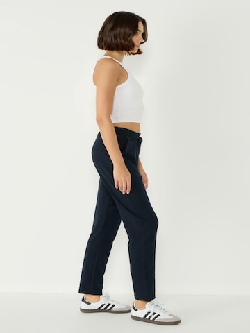 C&City Tapered Hose in Schwarz