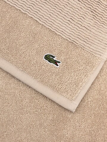 LACOSTE Handtuch 'LLECROCO'‌ in Braun