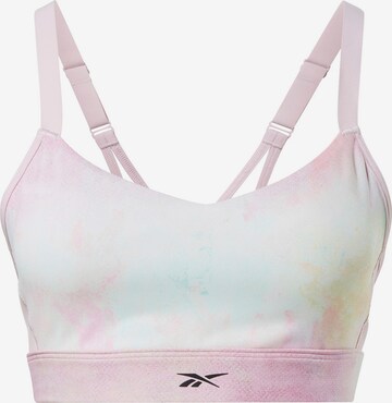 Reggiseno sportivo 'Lux Strappy' di Reebok in rosa: frontale