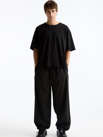 Wide leg Pantaloni di Pull&Bear in nero