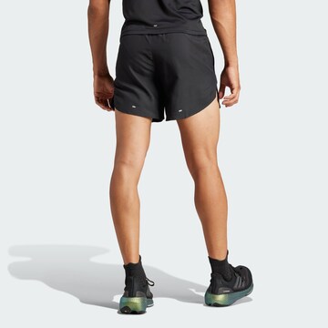 Loosefit Pantalon de sport 'Run It' ADIDAS PERFORMANCE en noir