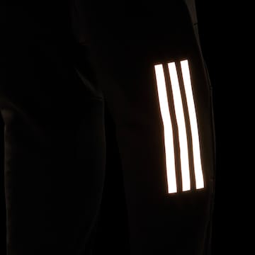 ADIDAS PERFORMANCE Slimfit Παντελόνι φόρμας 'Own The Run Astro ' σε μαύρο