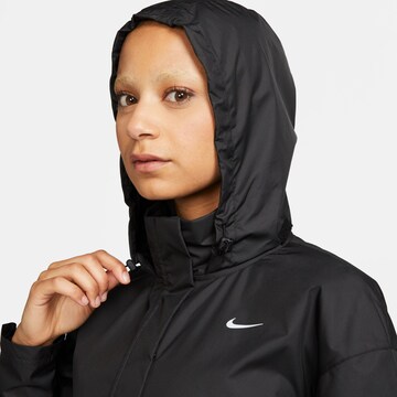 NIKE Sportovní bunda 'FAST' – černá