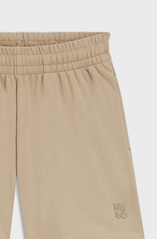 HUGO Loose fit Pants 'Ninosta' in Brown