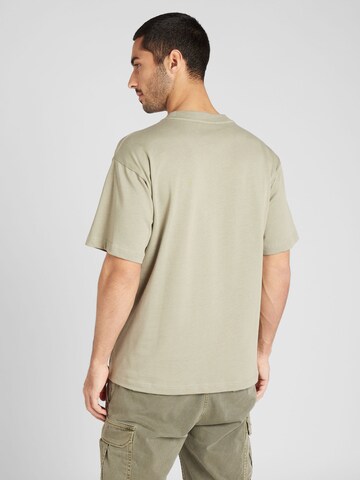 NORSE PROJECTS T-shirt 'Simon' i grön