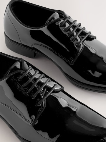 Chaussure à lacets Next en noir