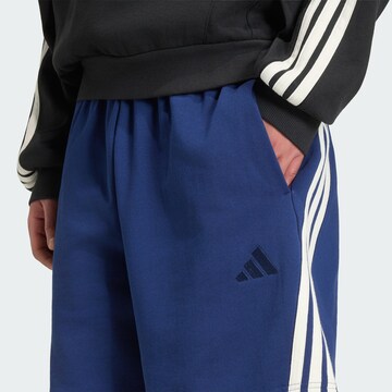 ADIDAS SPORTSWEAR Lużny krój Spodnie sportowe w kolorze niebieski