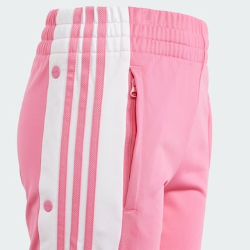 Coupe slim Pantalon 'Adibreak' ADIDAS ORIGINALS en rose