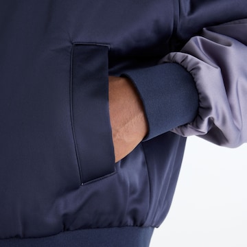 Veste de sport 'Sport Legacy Stadium Jacket' new balance en bleu
