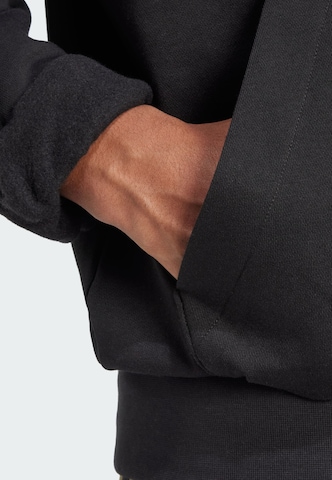 ADIDAS SPORTSWEAR Sports sweatshirt 'Feelcozy' in Black