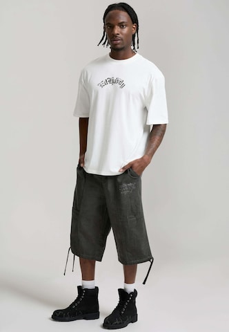 Loosefit Pantalon cargo 'Flying Phoenix' Ed Hardy en bleu