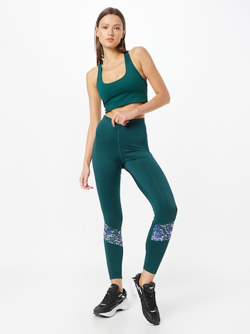 Skinny Pantalon de sport 'Modern Safari' Reebok en vert