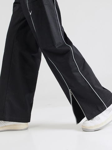 Nike Sportswear Wide leg Παντελόνι 'STREET' σε μαύρο