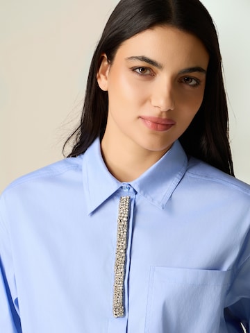 Maglietta di oltre in blu