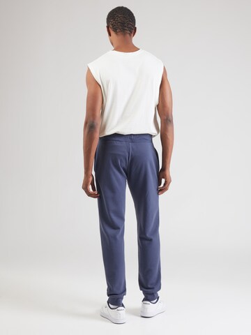 Effilé Pantalon Superdry en bleu