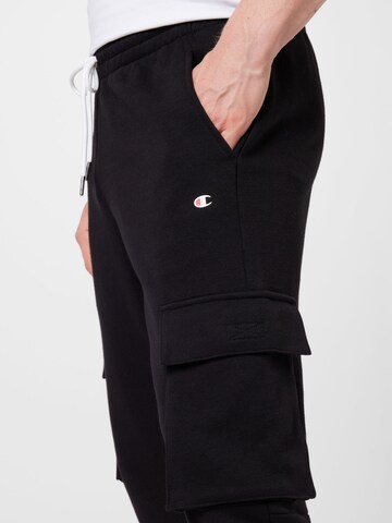 Tapered Pantaloni sportivi di Champion Authentic Athletic Apparel in nero