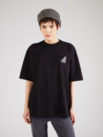 Regular T-shirt Calvin Klein Jeans en noir : devant