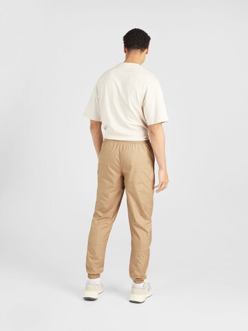 Effilé Pantalon de sport 'MCFC Prematch' PUMA en beige