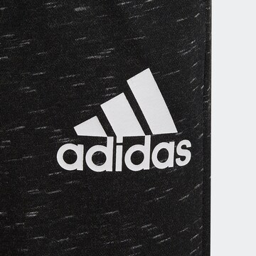 ADIDAS SPORTSWEAR Tapered Workout Pants 'Future Icons Badge Of Sport' in Black