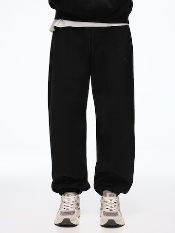Effilé Pantalon Bershka en noir : devant