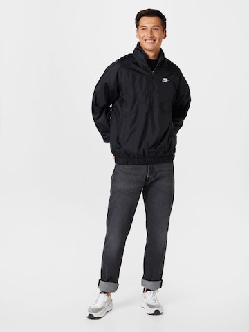 Nike Sportswear Φθινοπωρινό και ανοιξιάτικο μπουφάν 'Windrunner' σε μαύρο