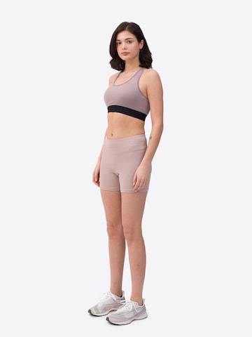 Skinny Pantaloni sportivi di 4F in beige