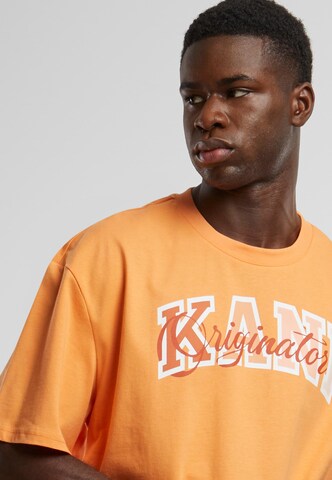 Karl Kani Shirt 'Serif Originator' in Oranje