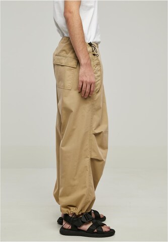 Effilé Pantalon cargo Urban Classics en beige